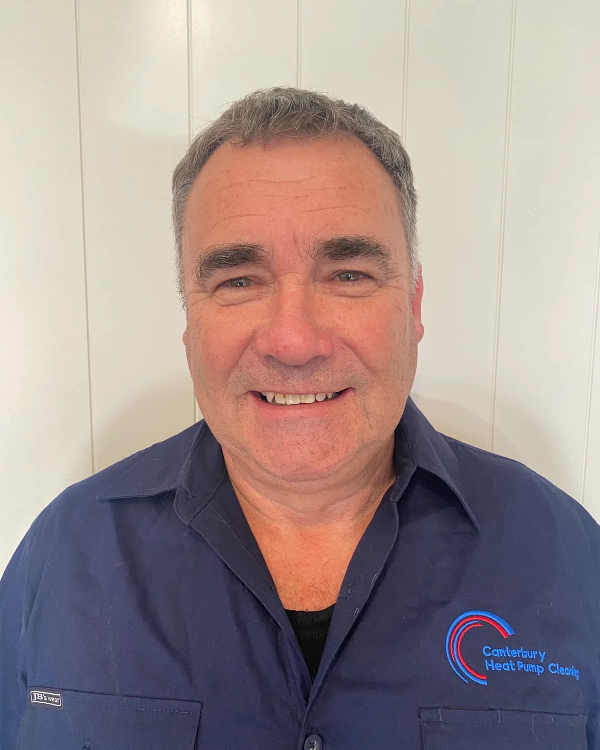 Mark Groufsky, owner and operator of Canterbury Heat Pump Cleaning, in his work shirt